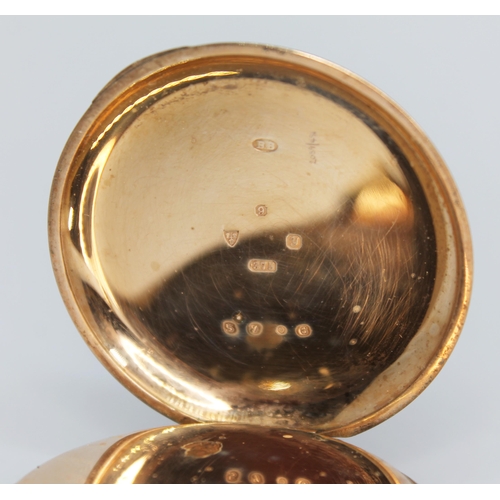 123 - A 1920s hallmarked 9ct gold Elgin open face pocket watch, the signed silvered dial having Art Deco A... 