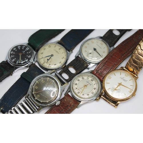 140 - A collection of six vintage manual wind mechanical wristwatches comprising a Paul Buhre and a Garrar... 