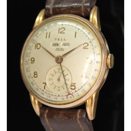 142 - A vintage gold plated Tell perpetual calendar wristwatch with signed champagne dial having Arabic nu... 