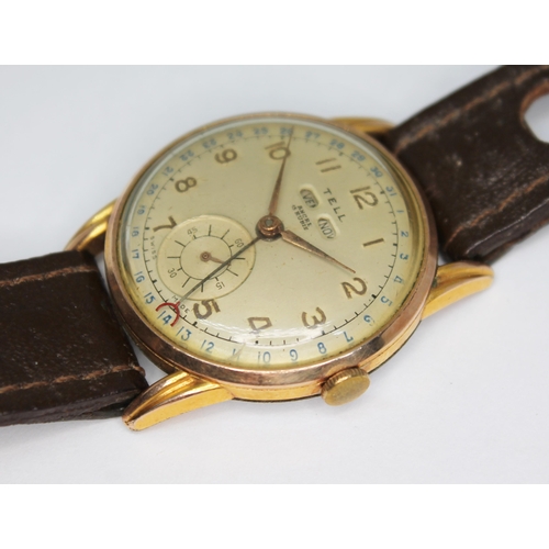 142 - A vintage gold plated Tell perpetual calendar wristwatch with signed champagne dial having Arabic nu... 