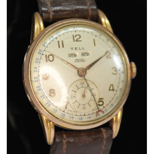 142 - A vintage gold plated Tell perpetual calendar wristwatch with signed champagne dial having Arabic nu... 