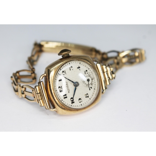 150 - A 1950s hallmarked 9ct gold Rotary 15 jewel manual wind ladies wristwatch on rolled gold strap, the ... 