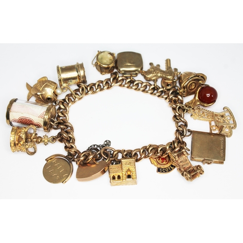 160 - A 9ct gold charm bracelet with 16 various charms including a police helmet etc. gross wt. 45.17g, le... 