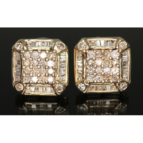 180 - A pair of Art Deco diamond cluster earrings, each stud set with 16 round brilliant cut diamonds to c... 