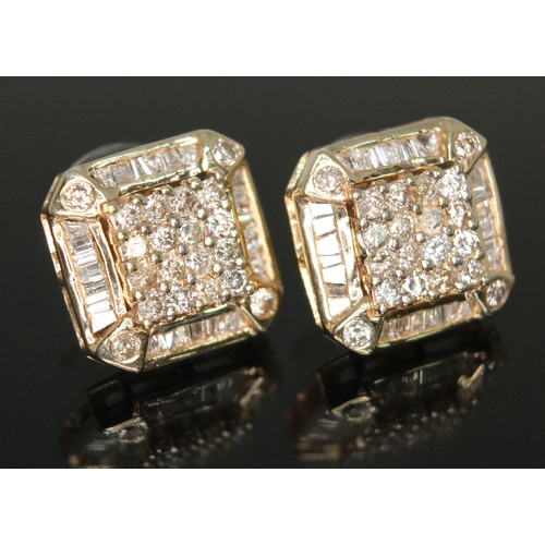 180 - A pair of Art Deco diamond cluster earrings, each stud set with 16 round brilliant cut diamonds to c... 