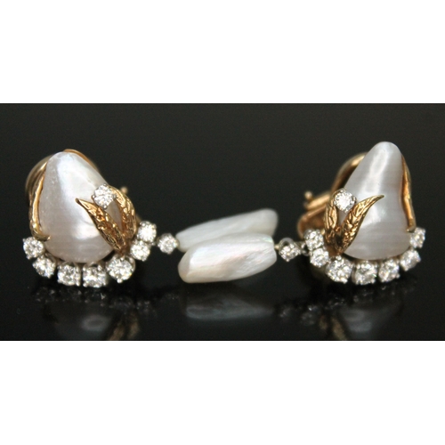 181 - A pair of diamond and pearl drop earrings, each naturalistically formed with a central baroque blist... 