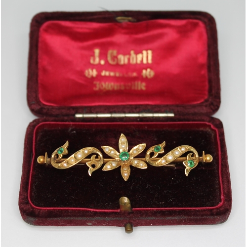 195 - An Australian(?) brooch set with split pearls and green stones, length 60mm, marked '15' with indist... 