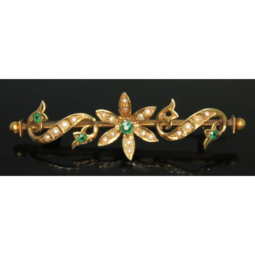 195 - An Australian(?) brooch set with split pearls and green stones, length 60mm, marked '15' with indist... 