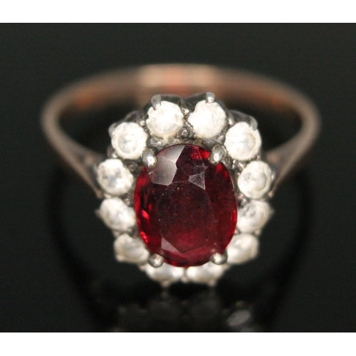 197 - A suite of garnet and white sapphire jewellery comprising a bracelet, necklace, ring and a pair of e... 