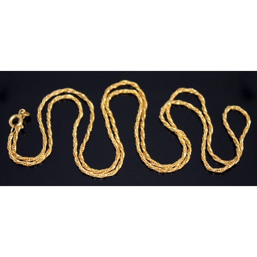 198 - An Italian fancy twist chain, marked '750' with Italian hallmarks, wt. 7.33g, length 69cm.