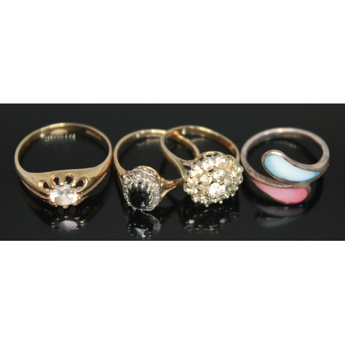 204 - Three 9ct gold rings comprising a solitaire, a cluster and a sapphire and diamond cluster, together ... 