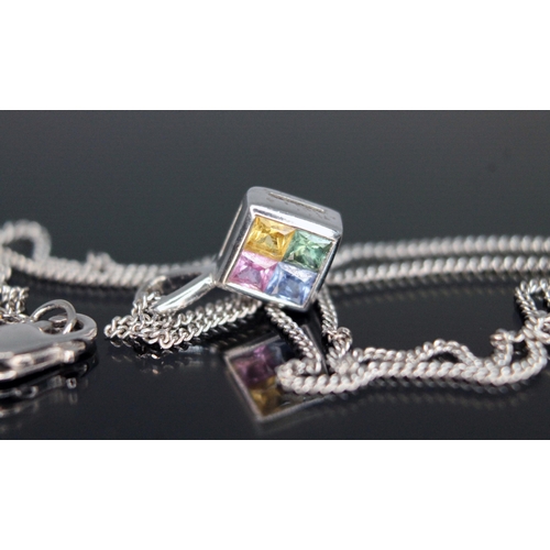 210 - A fancy sapphire pendant on chain, featuring four princess cut sapphires in blue, pink, yellow and g... 