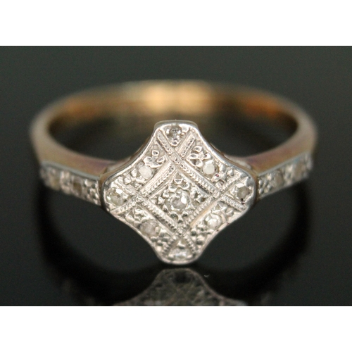 217 - An early 20th century Art Deco diamond cluster ring, marked '18ct PLAT', gross wt. 2.69g, size M.