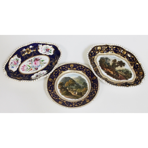 354 - Three Derby porcelain dishes comprising two with landscape scenes, one entitled View in Wales and th... 