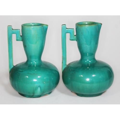 363 - A pair of Christopher Dresser for Lear pottery vases, height 15.5cm.