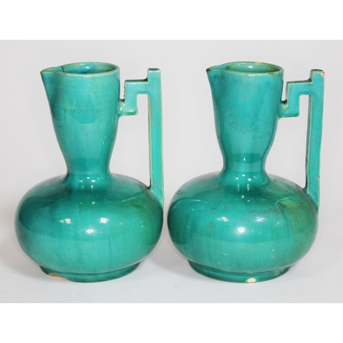 363 - A pair of Christopher Dresser for Lear pottery vases, height 15.5cm.