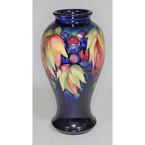 365 - A Moorcroft pottery vase, height 22.5cm, impressed and painted marks to base.