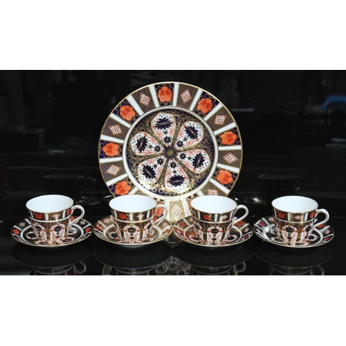 369 - Four Royal Crown Derby cups and saucers and plate.