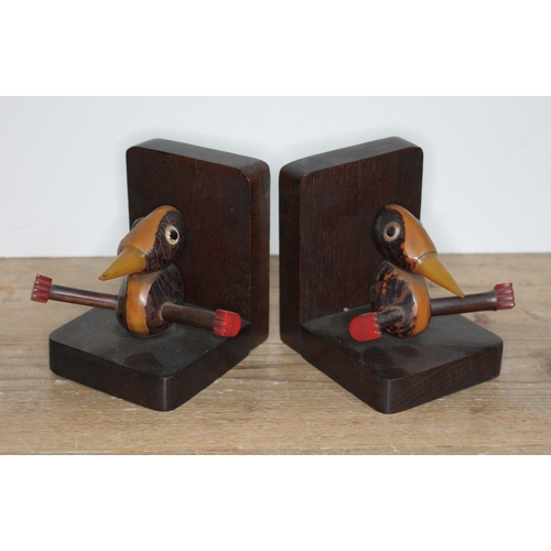 392 - A pair of Art Deco mixed wood and bakelite bookends.