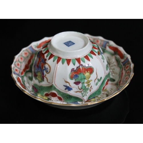 341 - A Worcester porcelain tea bowl and saucer, 18th century, decorated with Dragons in Compartments patt... 