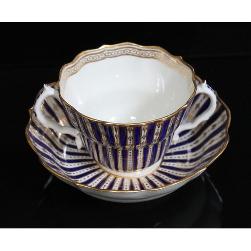 346 - A Worcester porcelain chocolate cup and saucer, circa 1770, of scalloped form and decorated in blue ... 