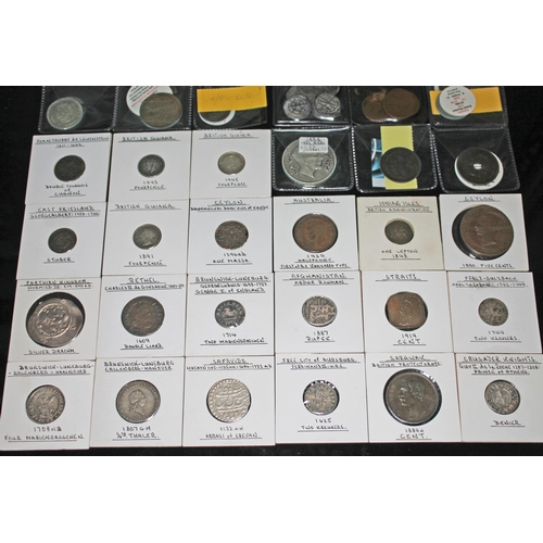 333 - A collection of world coins to include 6 x Malaysia Malacca lead coins c 1580, 1 x East Friesland Ge... 