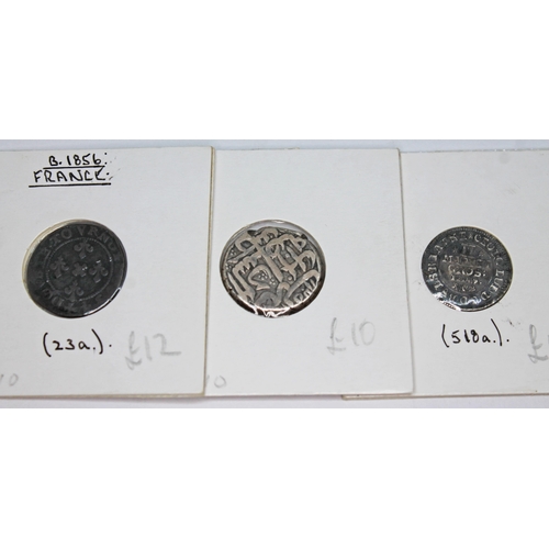 333 - A collection of world coins to include 6 x Malaysia Malacca lead coins c 1580, 1 x East Friesland Ge... 