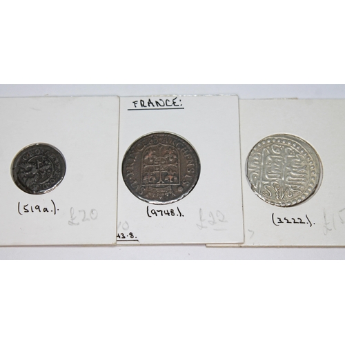 333 - A collection of world coins to include 6 x Malaysia Malacca lead coins c 1580, 1 x East Friesland Ge... 