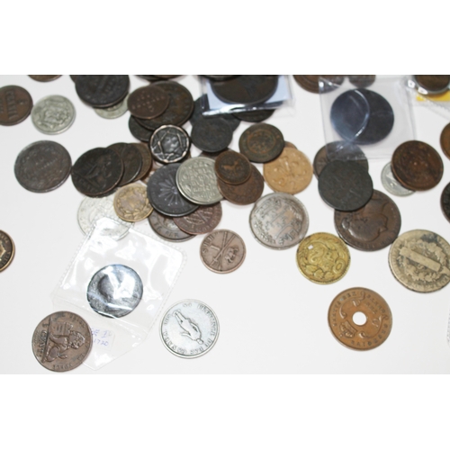 335 - A large collection of GB coins, world coins and tokens to include 36 x brass threepences various dat... 