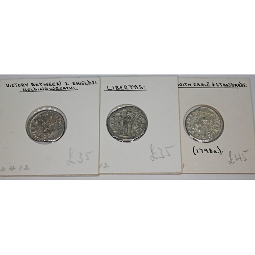 362 - A group of nine ancient Roman coins to include 3 x Elagabalus 218-222 A.D denarius (1 x Libertas, 1 ... 