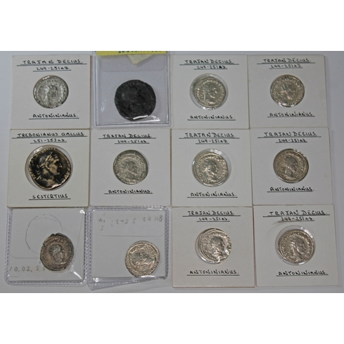 368 - A group of twelve ancient Roman coins to include Trajan Decius 249-251 A.D 1 x sestertius, 10 x anto... 