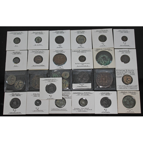 376 - A group of twenty eight coins to include 3 x Byzantine 6th century (2 x whole follis, 1 x part folli... 