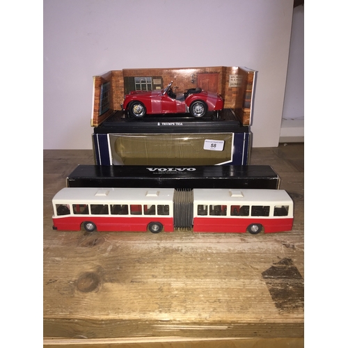 58 - A Kyosho Triumph TR3A (red) 1:18 model  in box and a Volvo B 10 M.Ledbuss model in box