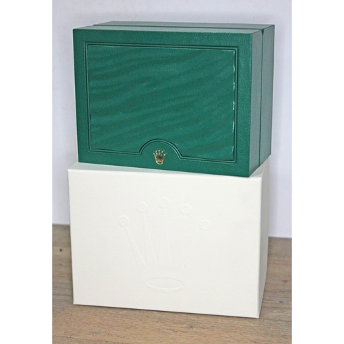 100 - A Rolex green watch box with tag and outer cardboard box.