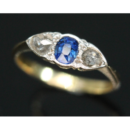 103 - A diamond and sapphire ring, the central oval mixed cut sapphire weighing approx. 0.42 carats, set b... 