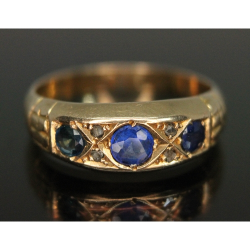 104 - An 18ct gold diamond, sapphire and blue garnet topped doublet ring, sponsor's mark 'JG', Chester 190... 