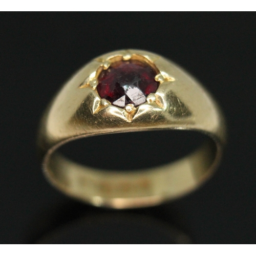 106 - An 18ct gold garnet signet ring, sponsor's mark rubbed, London 1923, gross wt. 6.07g, size L/M.