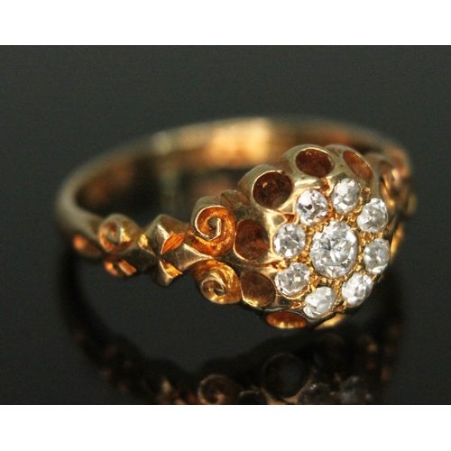 122 - An antique 18ct gold diamond cluster ring,featuring nine Old European cut diamonds, the cluster meas... 