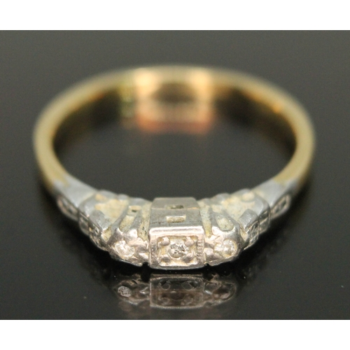 127 - An Art Deco three stone diamond ring, marked '18ct&PL..', gross wt. 2.21g, size L.