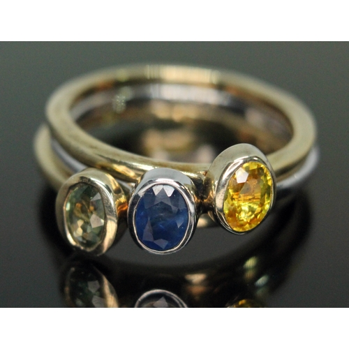 149 - A multi-functional three part green, yellow and blue sapphire ring, two gold plated, all marked '925... 