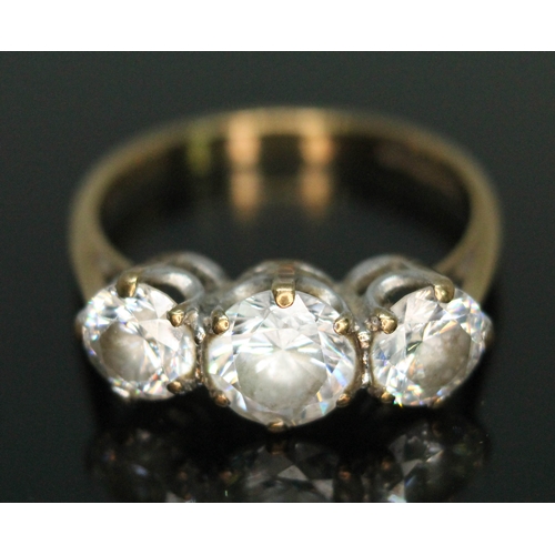 150 - A hallmarked 9ct gold three stone cubic zirconia ring, gross wt. 2.86g, size M.