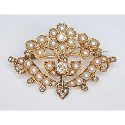 156 - A Victorian split pearl and diamond brooch of floral form, the central Old European cut diamond weig... 