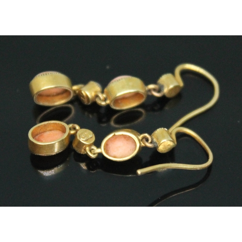 160 - A pair of early 20th century millegrain set coral cabochon and split pearl drop earrings, marked '15... 