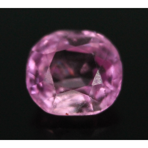 179 - A loose cushion cut fancy pink sapphire weighing 2.05 carats (0.41g).