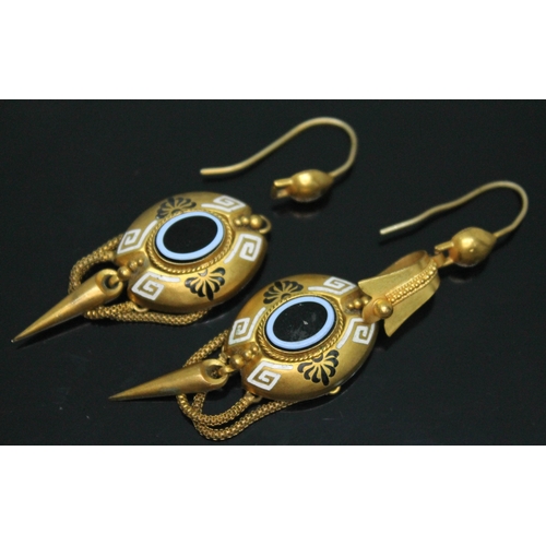 182 - A pair of Victorian gilt metal drop earrings, each set with an oval paste slab, length 71mm, gross w... 