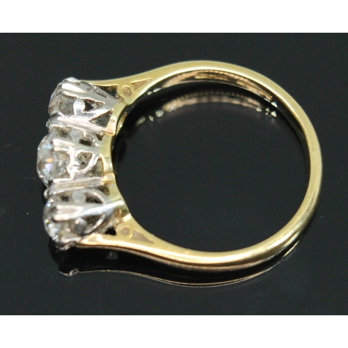 52 - A three stone diamond ring, the Old European cut diamonds weighing approx. 0.30, 0.72 & 0.33 carats,... 