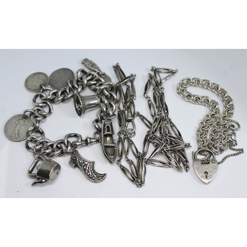 59 - Assorted silver and white metal comprising a charm bracelet, another bracelet and two chains, variou... 