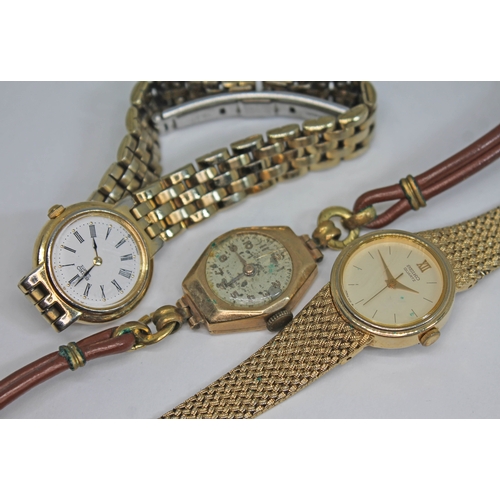 60 - A hallmarked 9ct gold ladies wristwatch and two other ladies watches.