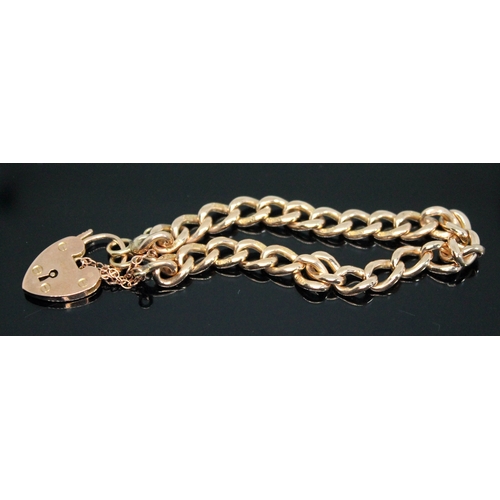 78 - An early 20th century link bracelet with heart shaped 'padlock' clasp, marked '9c', the links marked... 