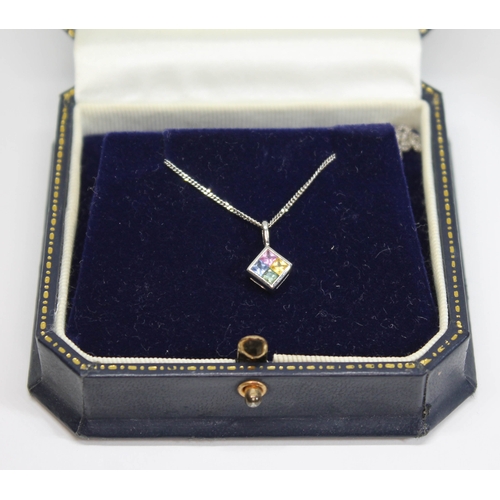 79 - A fancy sapphire pendant on chain, featuring four princess cut sapphires in blue, pink, yellow and g... 